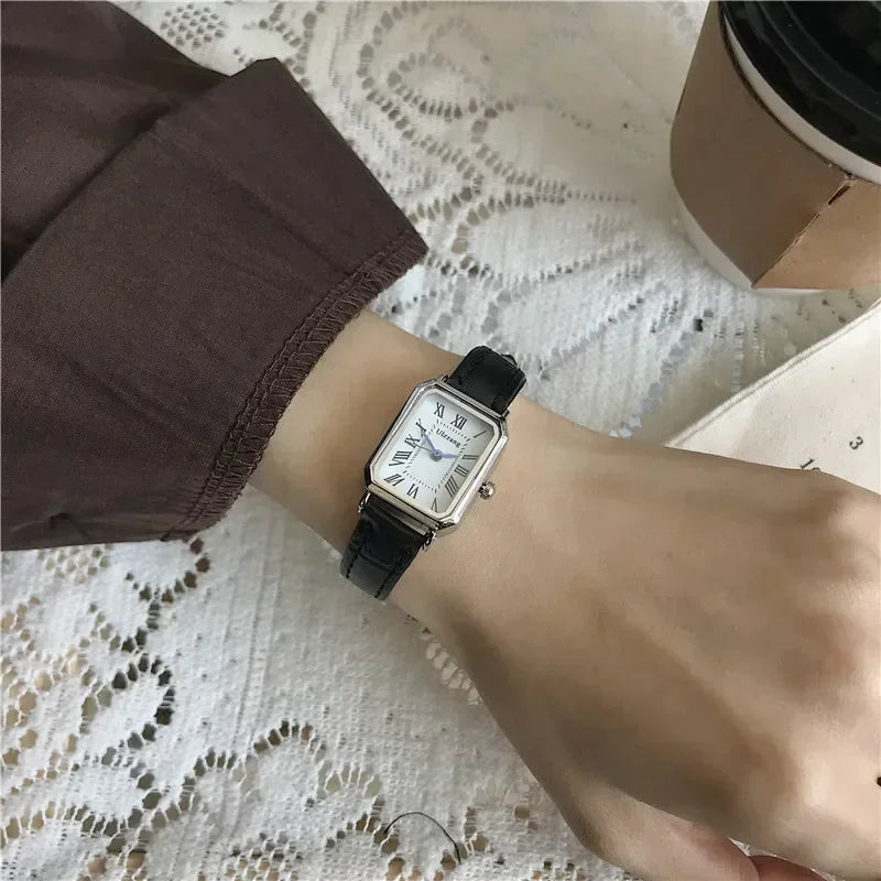 Women's rectangle watch with leather strap and vintage-inspired dial