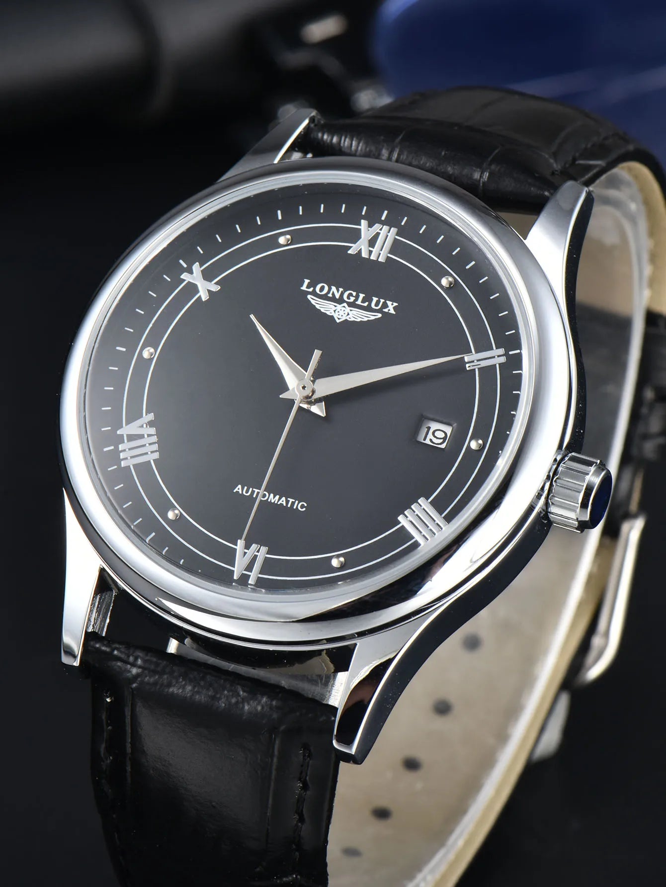 Automatic mechanical watch with date display and leather strap