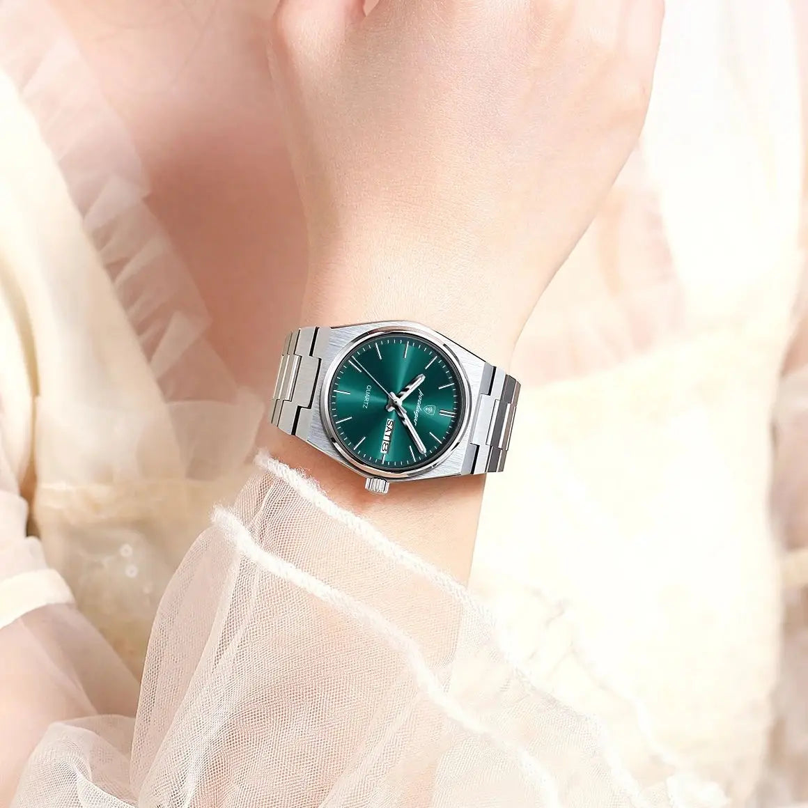 POEDAGAR Montres élégantes pour femmes Étanche Lumineux Date Semaine Montre Femme Quartz Acier inoxydable Montre-bracelet de mode pour femme