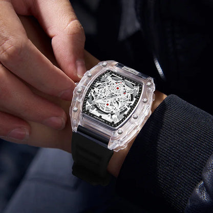 Montre Décontractée Tendance pour Homme Montre à Quartz pour Homme avec Cadran Lumineux, Fonction Calendrier, Bracelet en Silicone, Boîtier Transparent en Forme de Tonneau Reloj