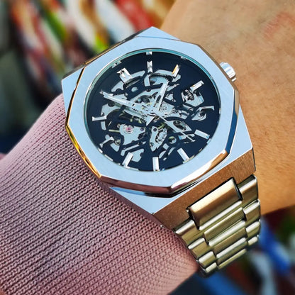Montre mécanique classique Forsining à squelette pour homme Aiguilles lumineuses Bracelet en acier inoxydable Montres automatiques d'affaires irrégulières